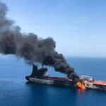 Oil tanker explodes after hitting a mine in Hormuz.